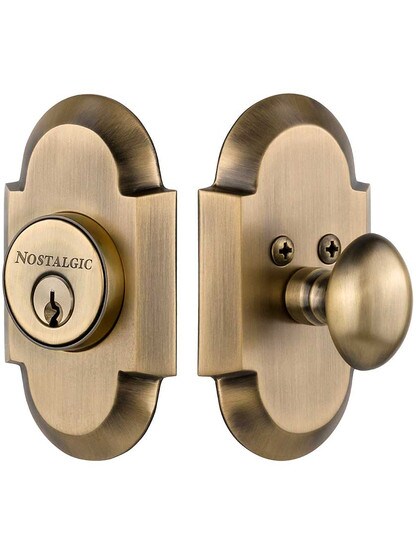Arched Single-Cylinder Deadbolt Keyed Differently in Antique Brass.